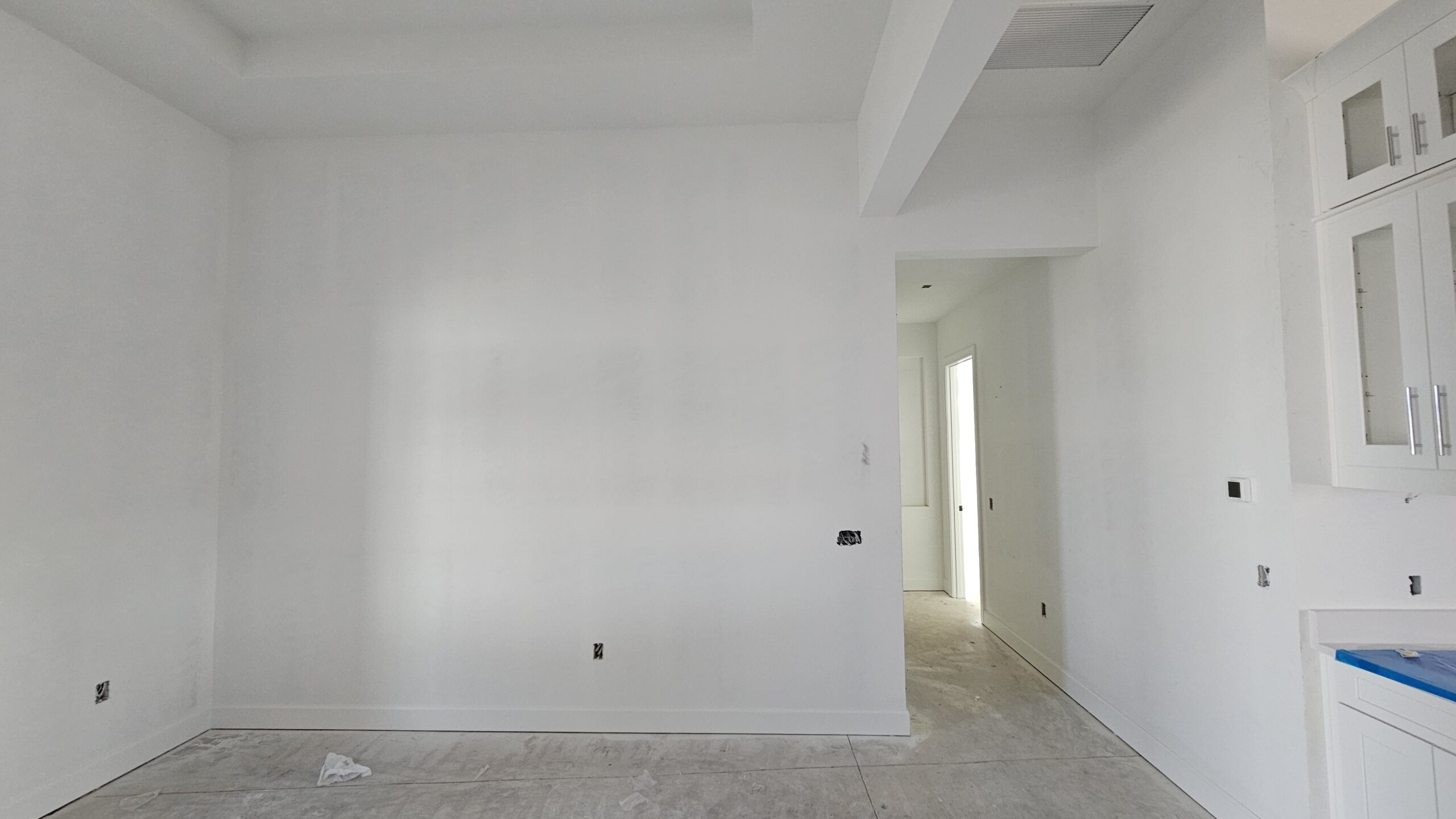 Naples Office Elegance: Stained Beam Tray Ceiling & Wood Trim Accent Project